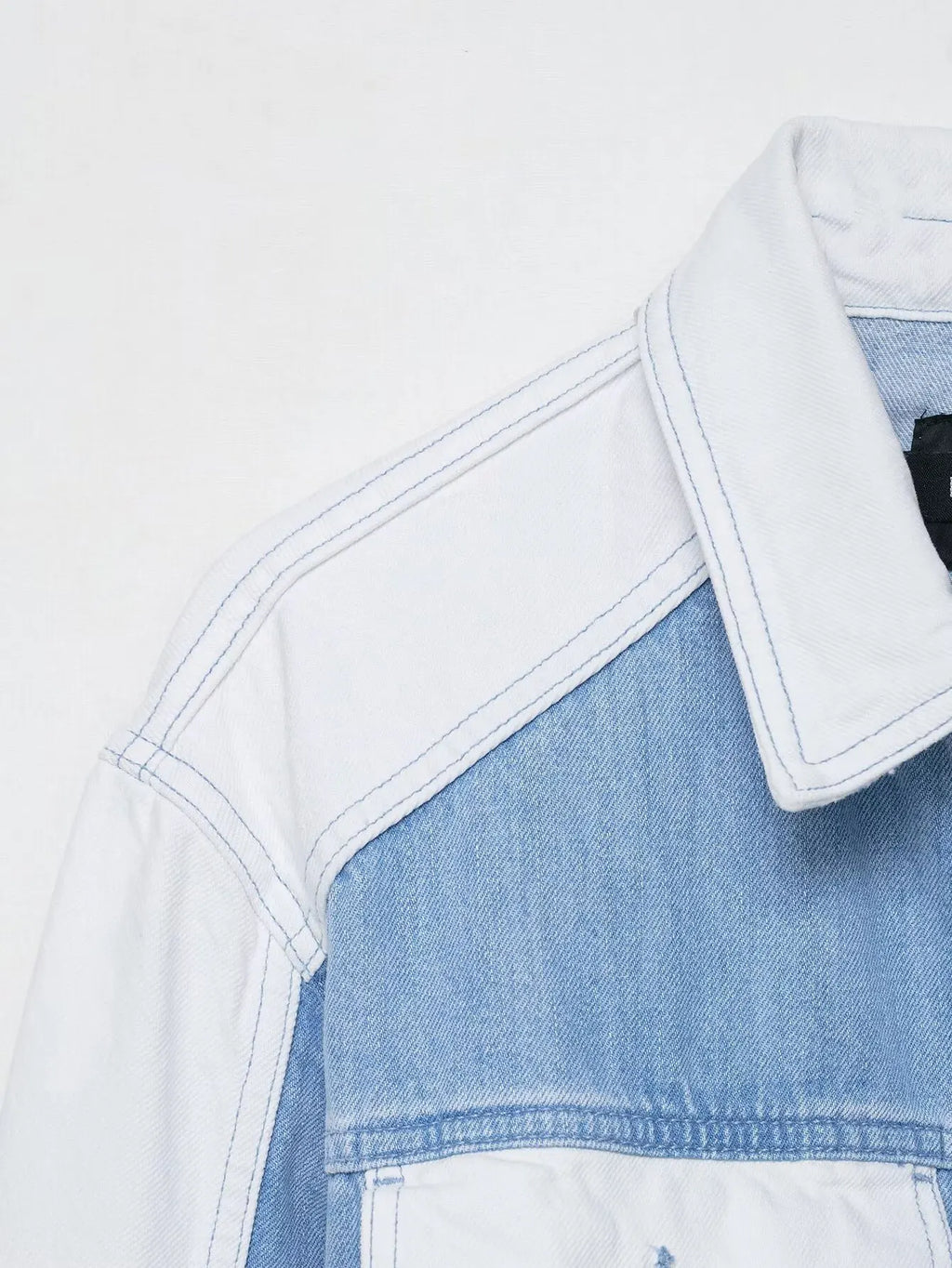 vintage denim women's outfit with a long-sleeve coat and wide-leg jeans