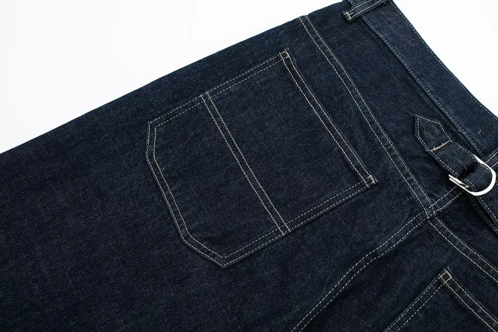 vintage denim women's outfit with a long-sleeve coat and wide-leg jeans