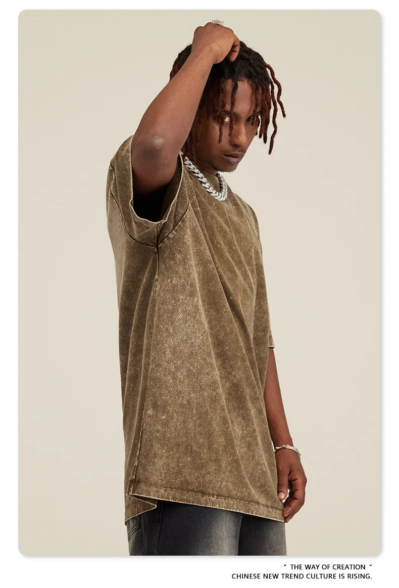 Here is a description based on your input:  Retro Arctic Monkeys Graphic T-Shirt, Vintage Washed, Oversized Fit, Y2K Style, Hip Hop Streetwear for Men