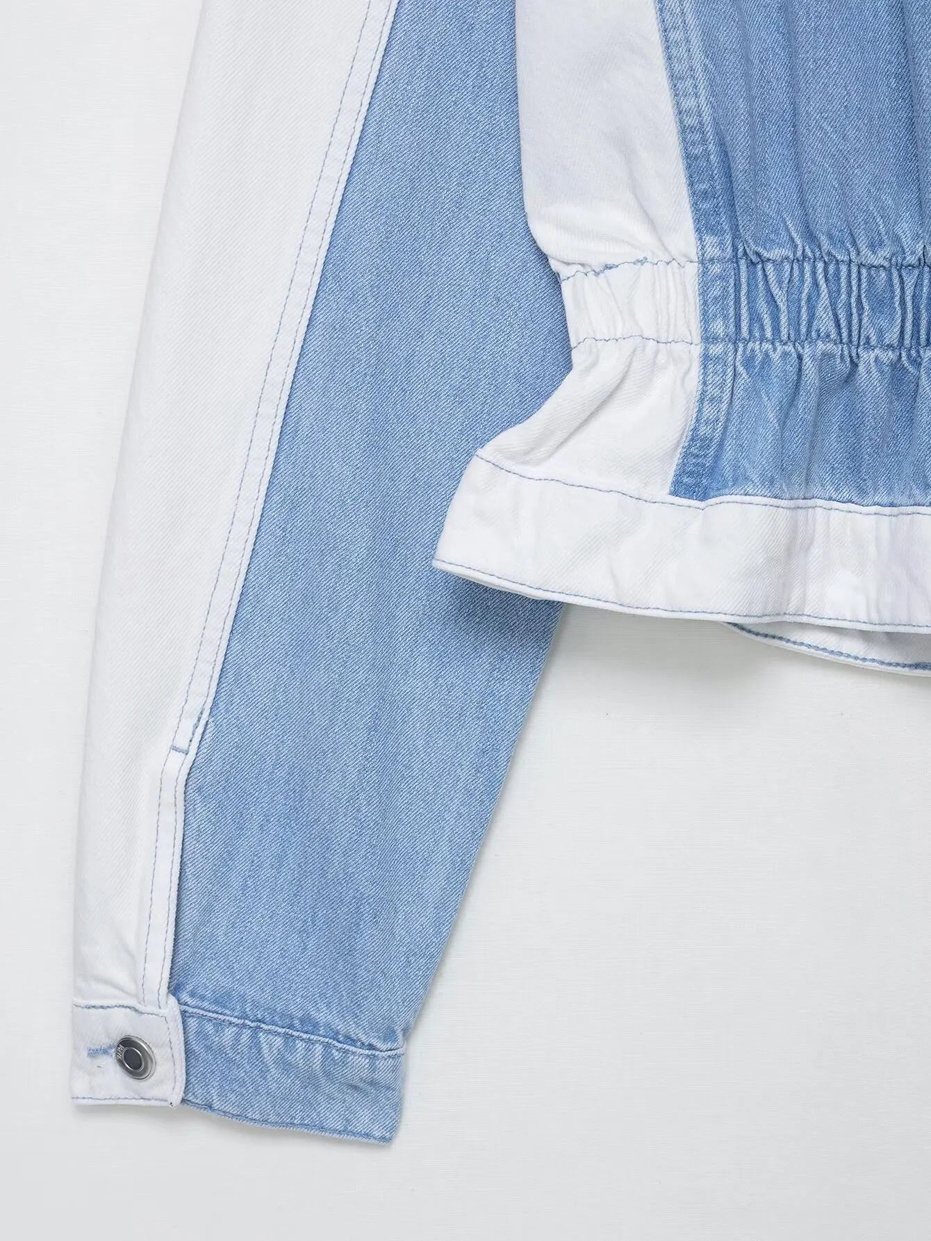 vintage denim women's outfit with a long-sleeve coat and wide-leg jeans