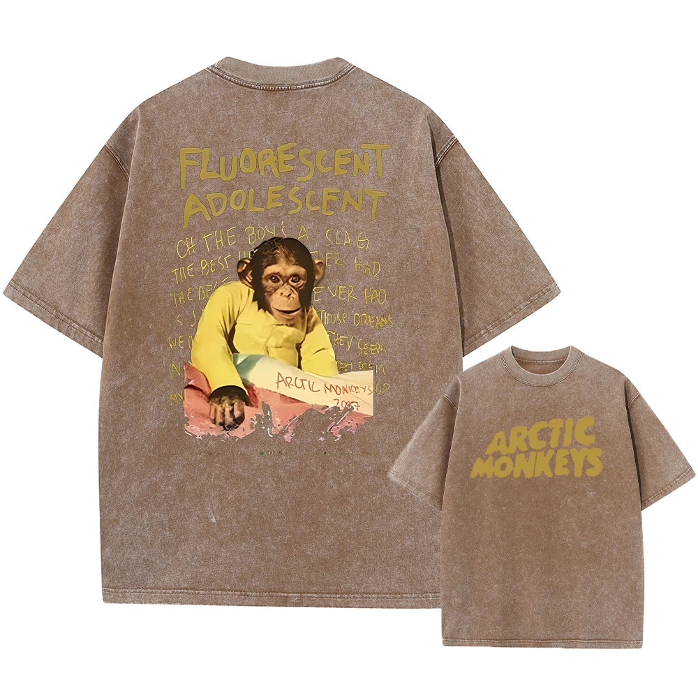 Here is a description based on your input:  Retro Arctic Monkeys Graphic T-Shirt, Vintage Washed, Oversized Fit, Y2K Style, Hip Hop Streetwear for Men