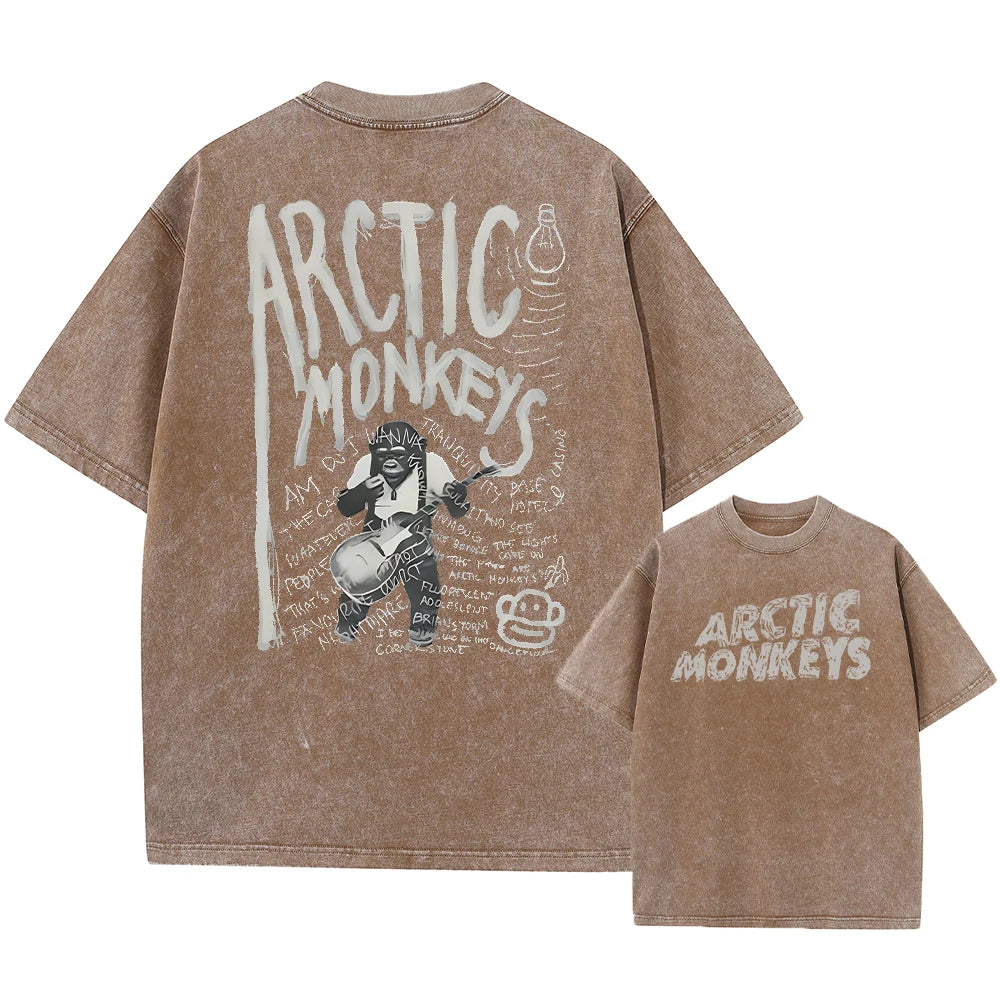 Here is a description based on your input:  Retro Arctic Monkeys Graphic T-Shirt, Vintage Washed, Oversized Fit, Y2K Style, Hip Hop Streetwear for Men