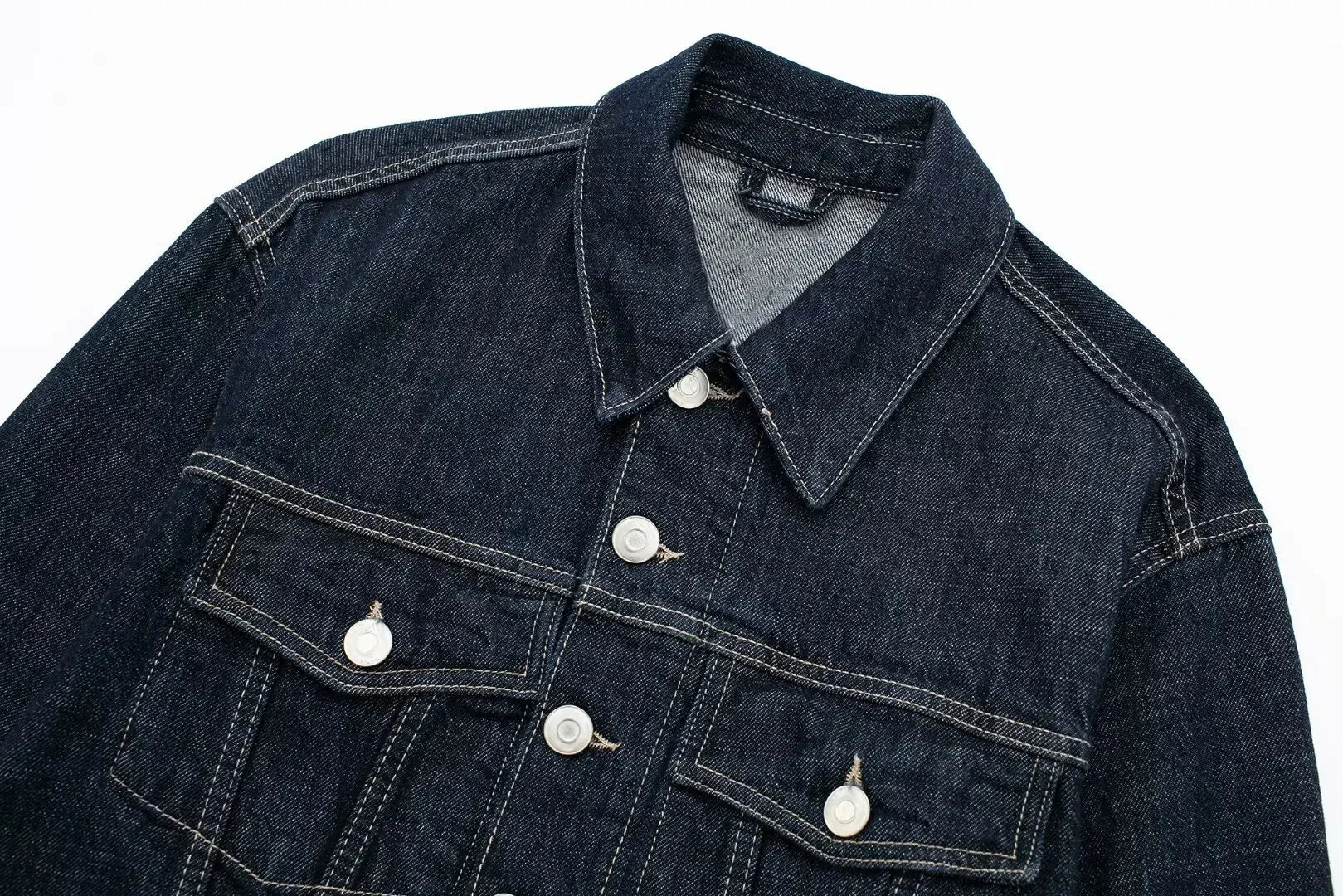 vintage denim women's outfit with a long-sleeve coat and wide-leg jeans