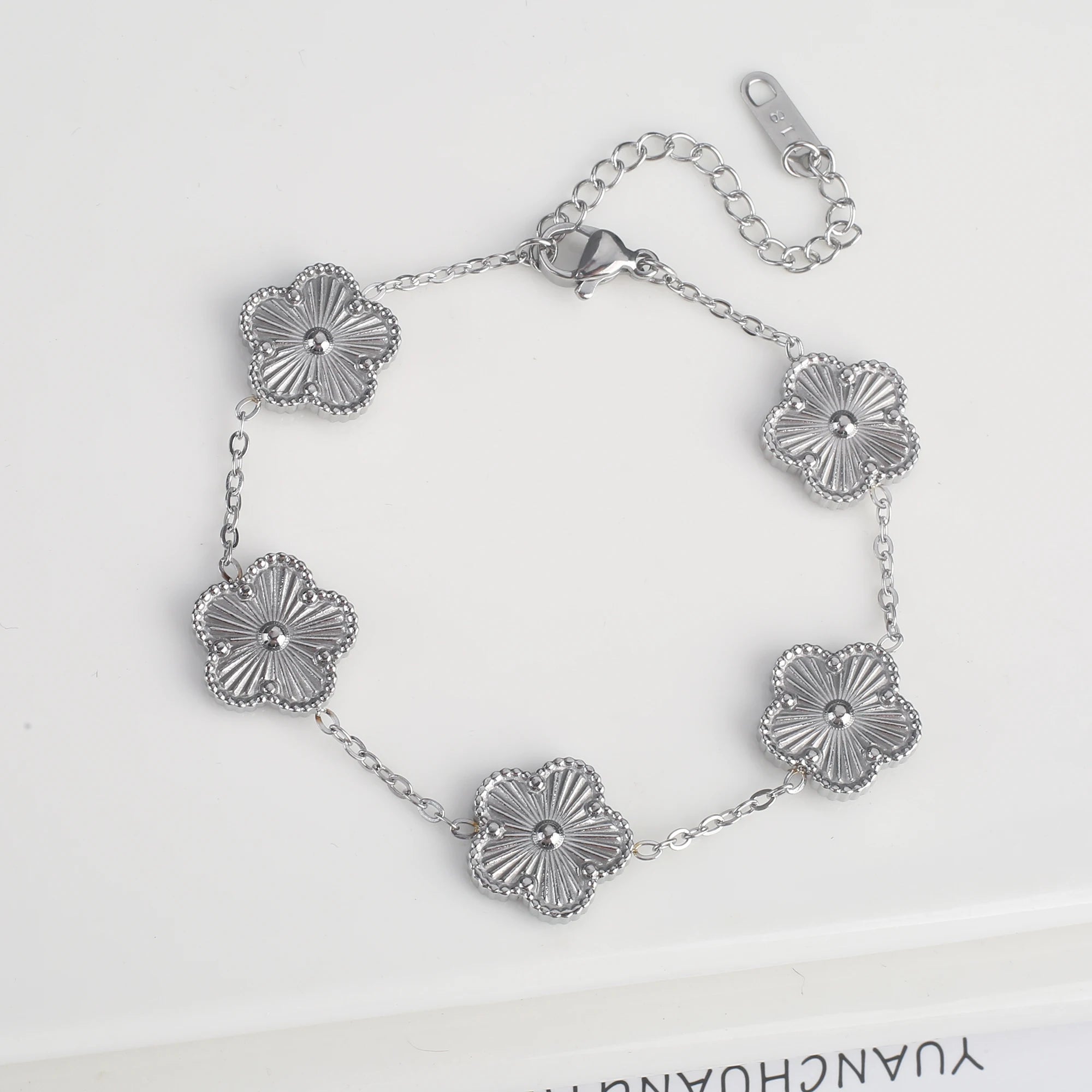 Classic Stainless Steel Five-Flower Bracelet – Adjustable Elegant Jewelry