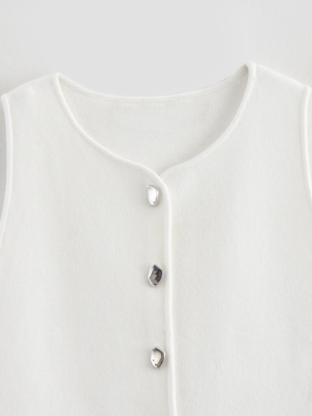 Pink sleeveless knit vest for women, cropped sweater top, yellow button design, streetwear waistcoat, stylish knitwear