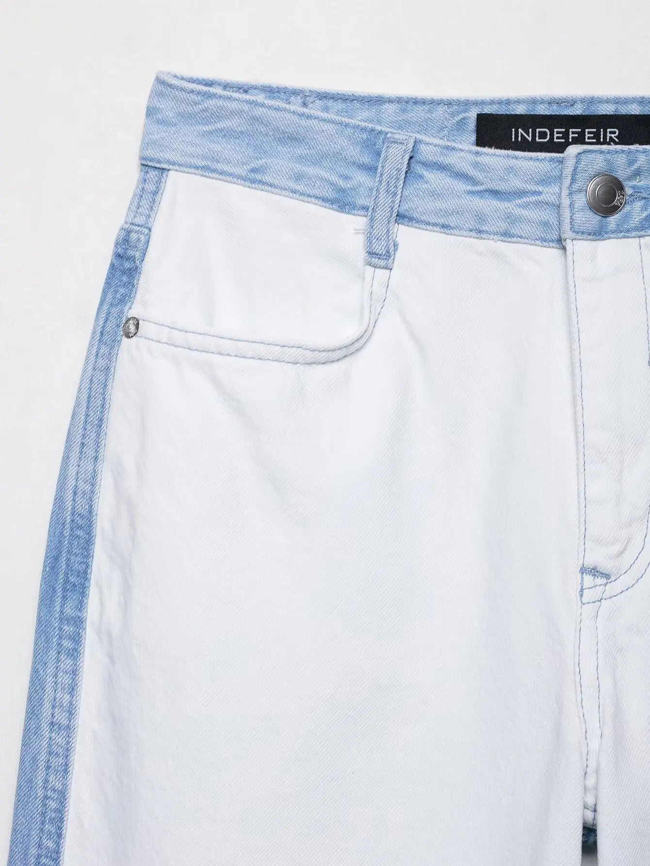 vintage denim women's outfit with a long-sleeve coat and wide-leg jeans