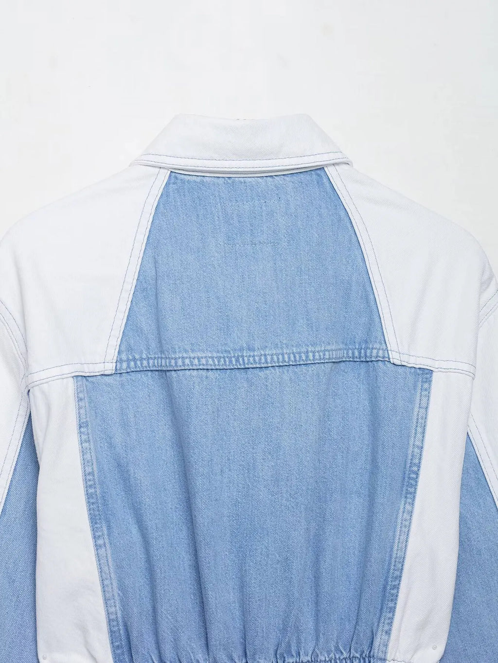 vintage denim women's outfit with a long-sleeve coat and wide-leg jeans