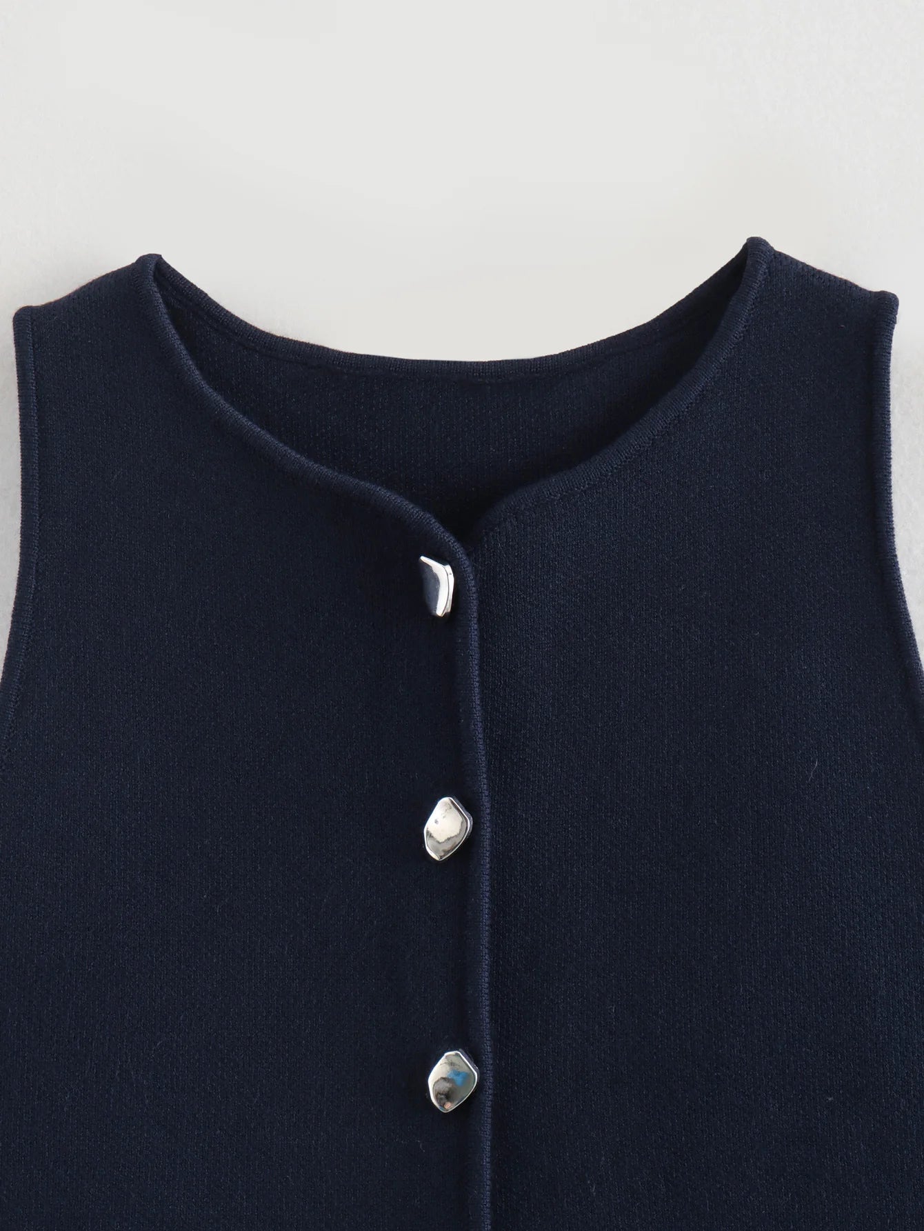 Pink sleeveless knit vest for women, cropped sweater top, yellow button design, streetwear waistcoat, stylish knitwear