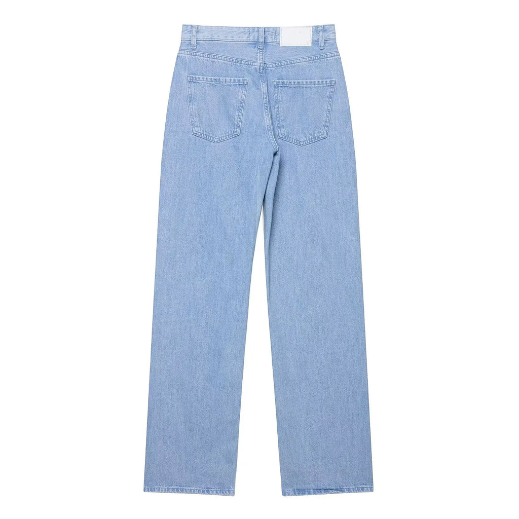 vintage denim women's outfit with a long-sleeve coat and wide-leg jeans