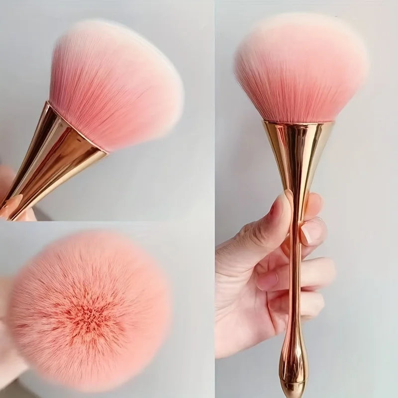 Rose gold fan brush with soft bristles, ideal for applying powder, highlighter, blush, and finishing touches