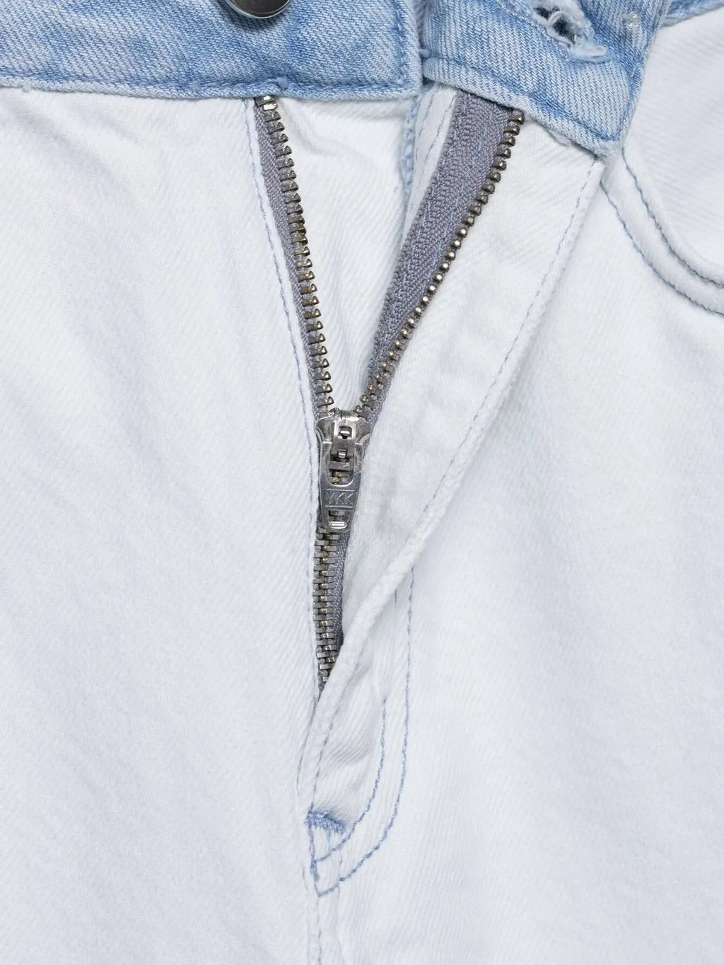 vintage denim women's outfit with a long-sleeve coat and wide-leg jeans