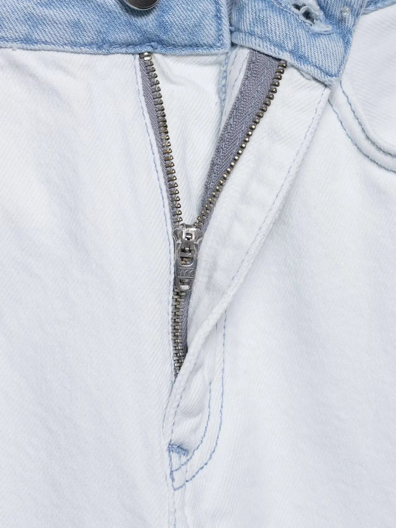 vintage denim women's outfit with a long-sleeve coat and wide-leg jeans