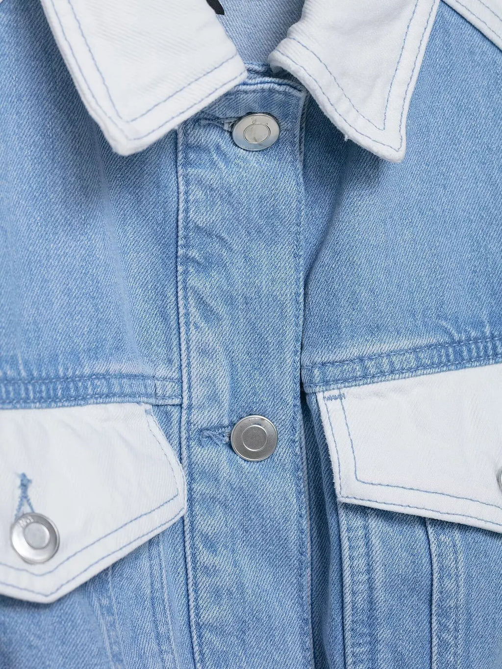 vintage denim women's outfit with a long-sleeve coat and wide-leg jeans