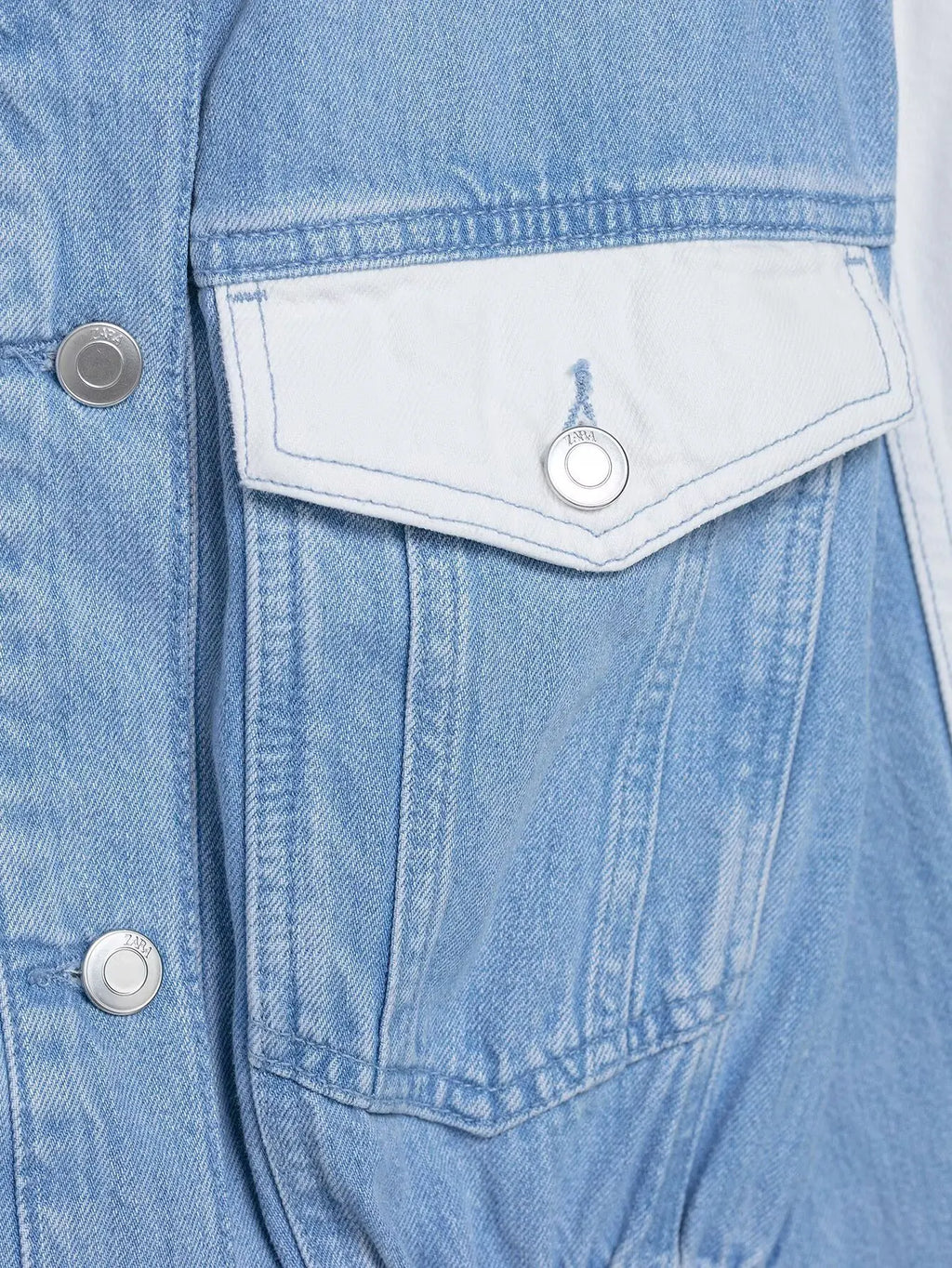 vintage denim women's outfit with a long-sleeve coat and wide-leg jeans