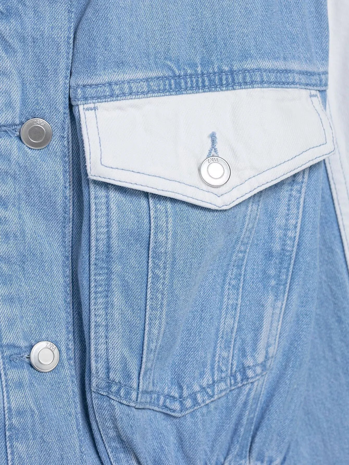 vintage denim women's outfit with a long-sleeve coat and wide-leg jeans