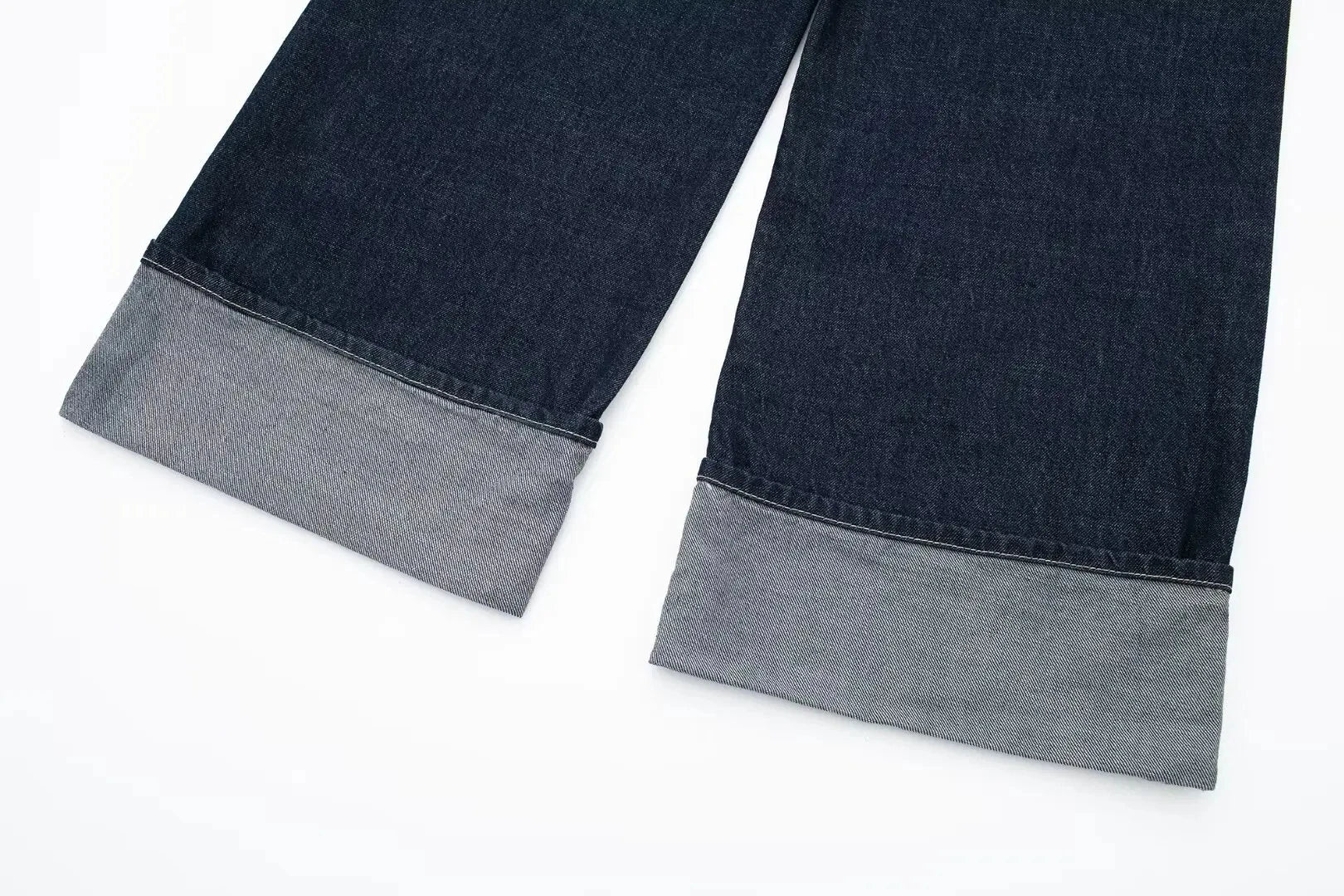 vintage denim women's outfit with a long-sleeve coat and wide-leg jeans