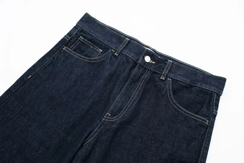 vintage denim women's outfit with a long-sleeve coat and wide-leg jeans