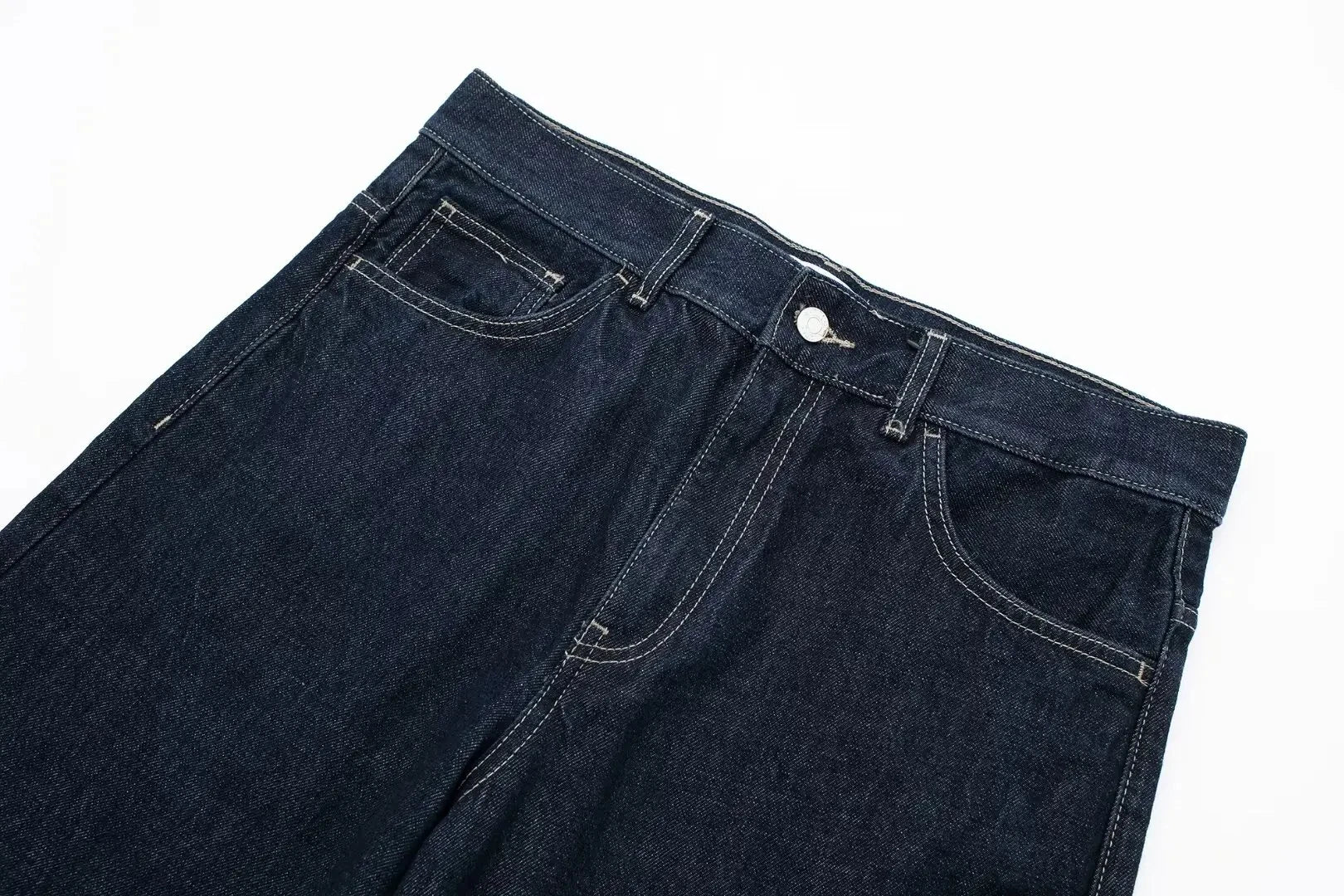 vintage denim women's outfit with a long-sleeve coat and wide-leg jeans