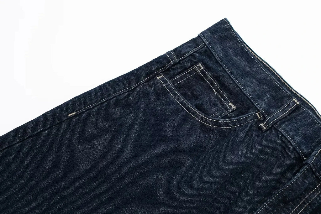 vintage denim women's outfit with a long-sleeve coat and wide-leg jeans