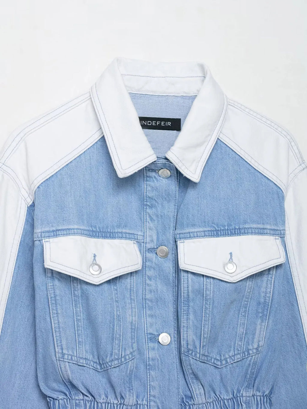 vintage denim women's outfit with a long-sleeve coat and wide-leg jeans