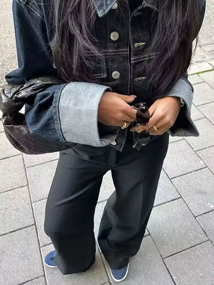 vintage denim women's outfit with a long-sleeve coat and wide-leg jeans