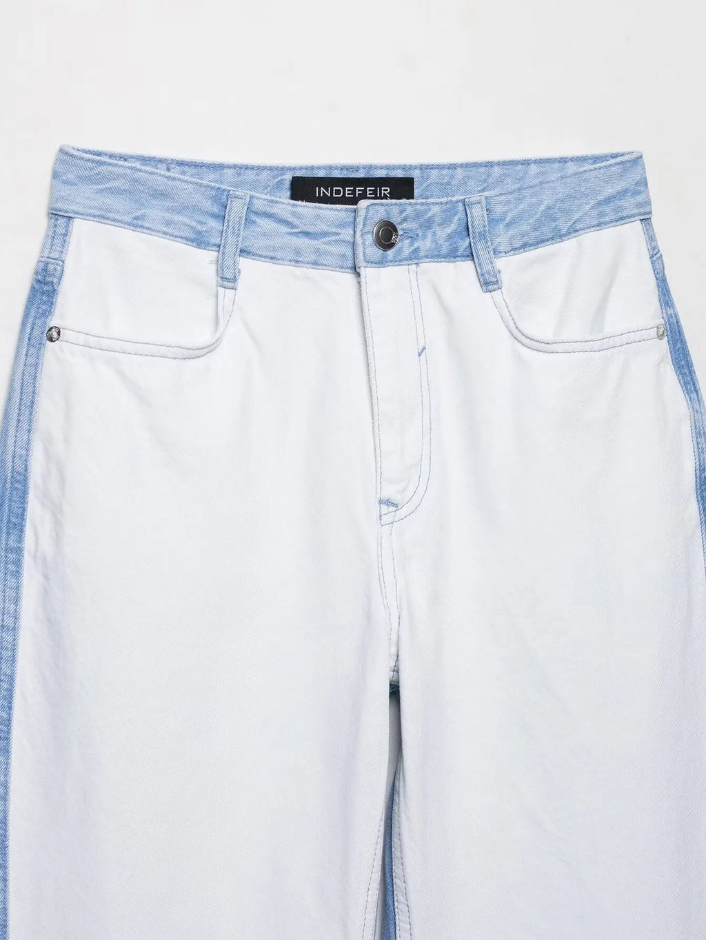 vintage denim women's outfit with a long-sleeve coat and wide-leg jeans